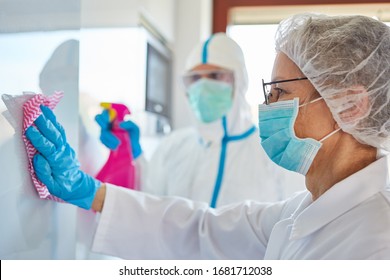 Disinfection and cleaning in the intensive care unit of a clinic with infectious Covid-19 patients - Shutterstock ID 1681712038