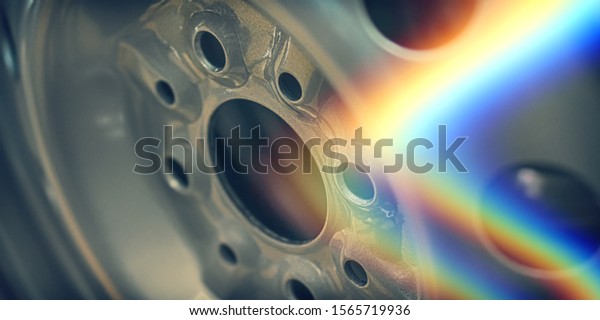 disk for car wheels with rainbow highlights\
fragment, macro