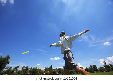 disk golf player showing throwing form. - Powered by Shutterstock