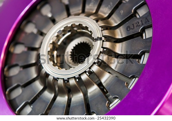 Disk of violet\
automobile clutch macro\
view
