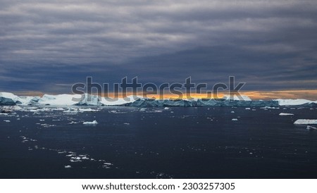 Image, Stock Photo Iceberg in golden evening light, Errera Channel Antarctica