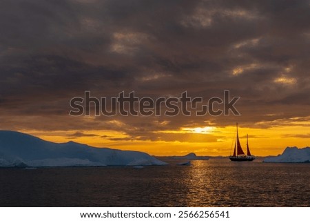 Similar – Image, Stock Photo Iceberg in golden evening light, Errera Channel Antarctica