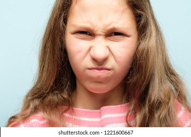 Dislike And Refusal. Unimpressed Girl Grimacing And Wrinkling Nose. Emotion Expression And Reaction Concept.