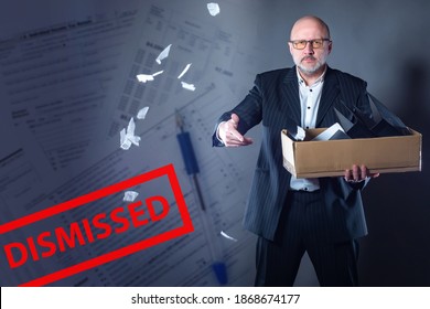 Dismissed. Inscription Dismissed Next To Man. Human Holds A Box And Vomits A Contract. Concept - Dismissal Of Employees. Man Lost His Job. Man Lost His Job. Box With Personal Items From The Office