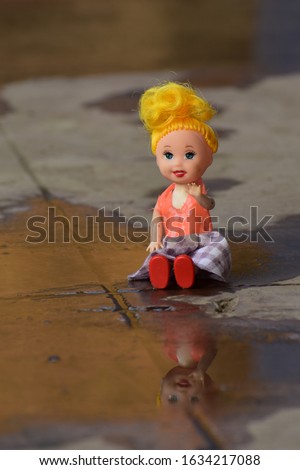 Disneyland, Anaheim, ca, Usa-a barbie doll is sitting and saying hello! A concept of a doll. Happy women's day.