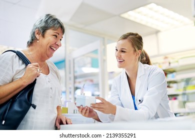 Dispensing the best treatment and advice. Shot of a young pharmacist assisting a customer. - Powered by Shutterstock