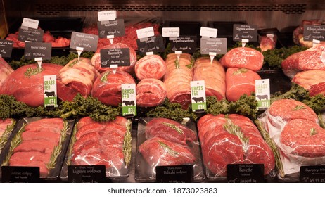 Display Of Assorted Chopped Raw Red Meat. Fresh Organic Meat Department In Supermarket