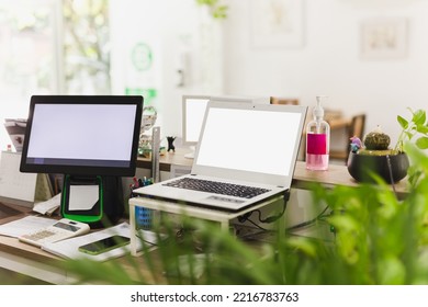 Display Cash Register Equipment And Laptop Monitor In Cafe Counter.