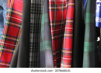 Display of colorful Scottish kilts. - Shutterstock ID 2078668141