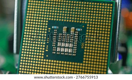 Display of CPU chip as result of engineering design and use of mining of rear earth materials. Rare earth elements, REE play critical role in CPU GPU RAM and SSD production for AI data centers.