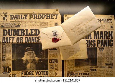 A display with an envelope sent from Hogwarts school with the Daily Prophet Newspaper in the background. Taken at Warner Bros. Harry Potter Studio Tour Drive, Leavesden WD25 7LR, UK, September 2, 2019