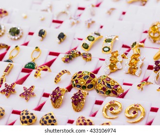 Display Of  Jewelry , Ruby Blue Sapphire And Diamond  On  Earrings