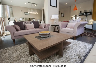 Display Lounge Area In Large Furniture Show Room With Sofa And Table