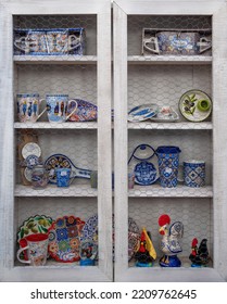 Display Of Traditional Portuguese Souvenirs And Cookware For Sale At The Central Square Of Obidos, Portugal. 