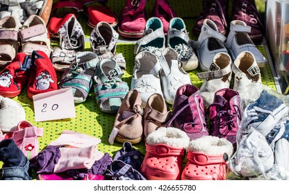 Display Of Used Girl Baby And Child Shoes For Charity,donating,reusing Or Reselling For Second Life Sold At Garage Sale At Springtime 
