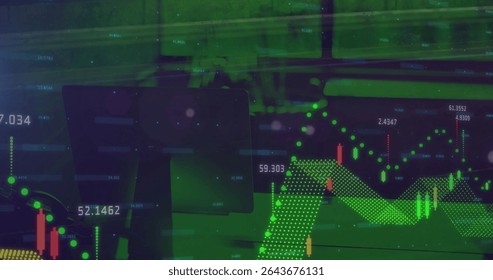 Displaying monitor on office desk under blinds overlaying candlestick histogram and line graph. Technology, finance, data visualization, analytics, digital, corporate, professional