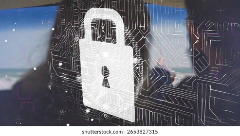 Displaying white padlock icon hovering over circuit board overlay at office desk, with monitors. Technology, innovation, cybersecurity, digital, workspace, communication, professionalism