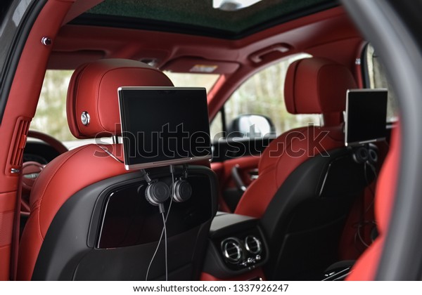 Displays in the rear\
seats of the luxury\
car.