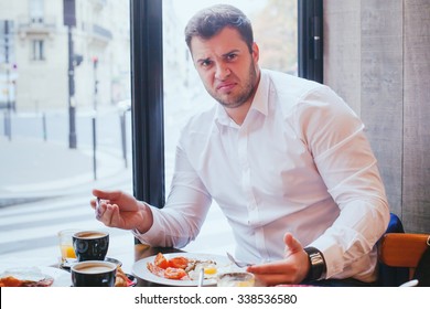 Displeased Angry Customer In Restaurant, Man Unhappy With Food And Bad Service