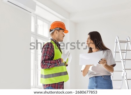 Displeased client and worker argue while discussing a blueprint and renovation project estimate for a home. The disagreement highlights conflict over planning and construction details.