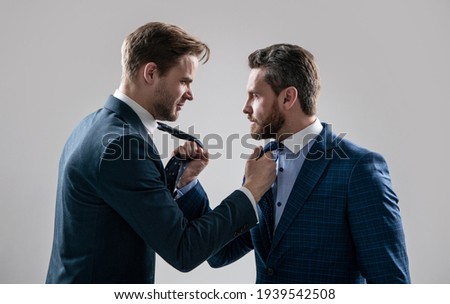 displeased colleague dispute. negotiations. businessmen talking and discussing conflict. boss and employee. disagreed men partners. business competition. businessmeeting. struggle for leadership.