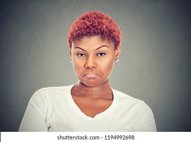 Displeased Upset Female Frowns Face As Going To Cry, Being Discontent And Unhappy Isolated On Gray Background. Dissapointed Woman Has Troubles