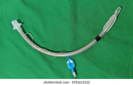 Disposable Anesthetic Airway Management Endotracheal Tube With Cuff On Green Background