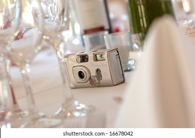 Disposable Camera On Wedding Reception Table