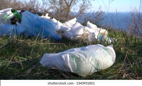 Disposable Diaper Waste In Landfill. Environmental Pollution