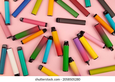 Disposable e-cigarettes with different flavors in pink. The concept of modern smoking, vaping and nicotine.
 - Shutterstock ID 2058505280