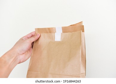 Disposable Eco Friendly Packaging With Craft Paper Shopping Bag Food In Hand To Home, Service Food Order Online Delivery Food Box Take Away Boxes