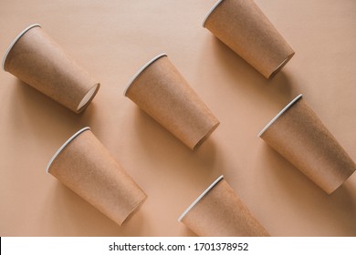 disposable paper biodegradable cups pattern on a beige background - Powered by Shutterstock