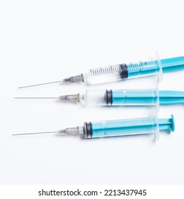 Disposable Plastic Syringe Prepared For Injection And Vaccination In The Hospital. The Concept Of Medicine And Health