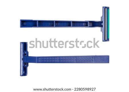 Disposable razor on a white background. Blue plastic razor isolated on a white background.