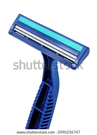 Disposable razor. Several blue razors on white background. Сlose-up.