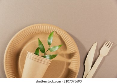 Disposable tableware from natural materials, wooden fork, knife. Biodegradable plate, Compostable cutlery