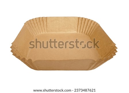 Disposable wax paper for your fryer isolated on white background with clipping path. Perspective front view of air fryer paper liner.