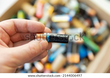 Disposal and collection of used batteries. The concept of collecting and disposing of used batteries. Recycling of batteries.