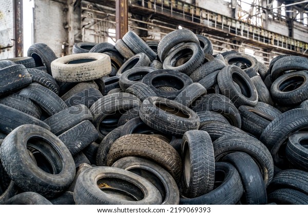 Disposal of waste tires. Landfill with old\
tires and tyres for\
recycling.