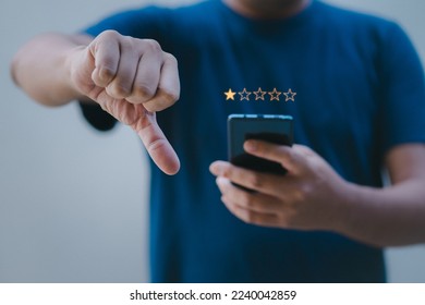 Dissatisfied customer experience concept, unhappy business customer with sad face  , bad review, bad service dislike poor quality, low rating, bad social media. - Shutterstock ID 2240042859