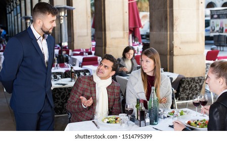 Dissatisfied People Expressing Displeasure With Food And Bad Service To Restaurant Manager