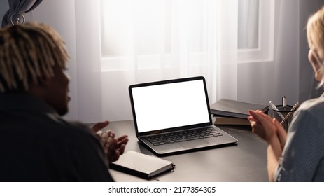 Distance Education. Happy Couple. Digital Mockup. Unrecognizable Woman And Black Man Sitting Desk With Laptop Blank Screen Clapping Hands In Light Shadow Room Interior.