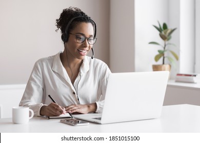 Distance education. Young woman using laptop computer at home. Student girl working in her room. Work or study from home, freelance, business, creative occupation,  e-learning, lifestyle concept - Shutterstock ID 1851015100