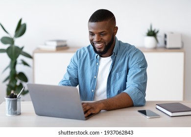 Distance Job. Millennial African American Man Working On Computer At Home Office