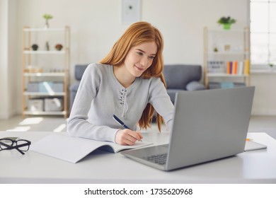 Distance Learning.Girl Studying A Lecture Online Using A Laptop Video Call At Home. Education Online Course For College University Students.