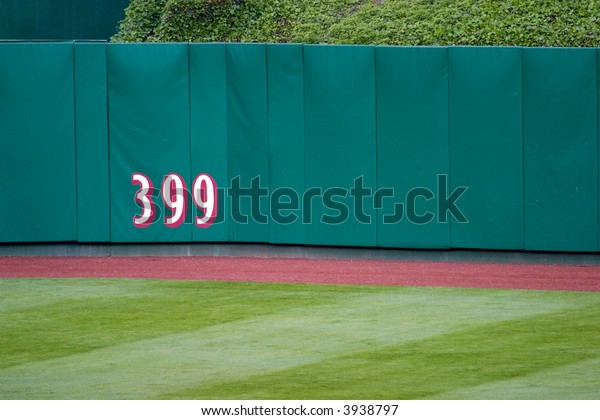 distance marker on outfield\
wall
