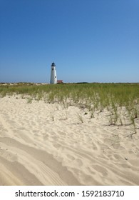 Distant lighthouse on the beach