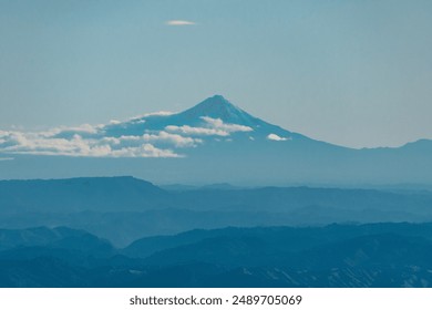 Distant Mountain Under Blue Sky