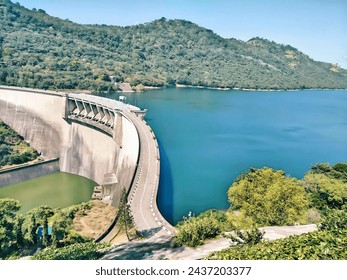 distant view of a dam, calm waters