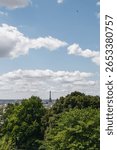 Distant View of Eiffel Tower from Parc de Belleville – Elevated Perspective over Paris Rooftops